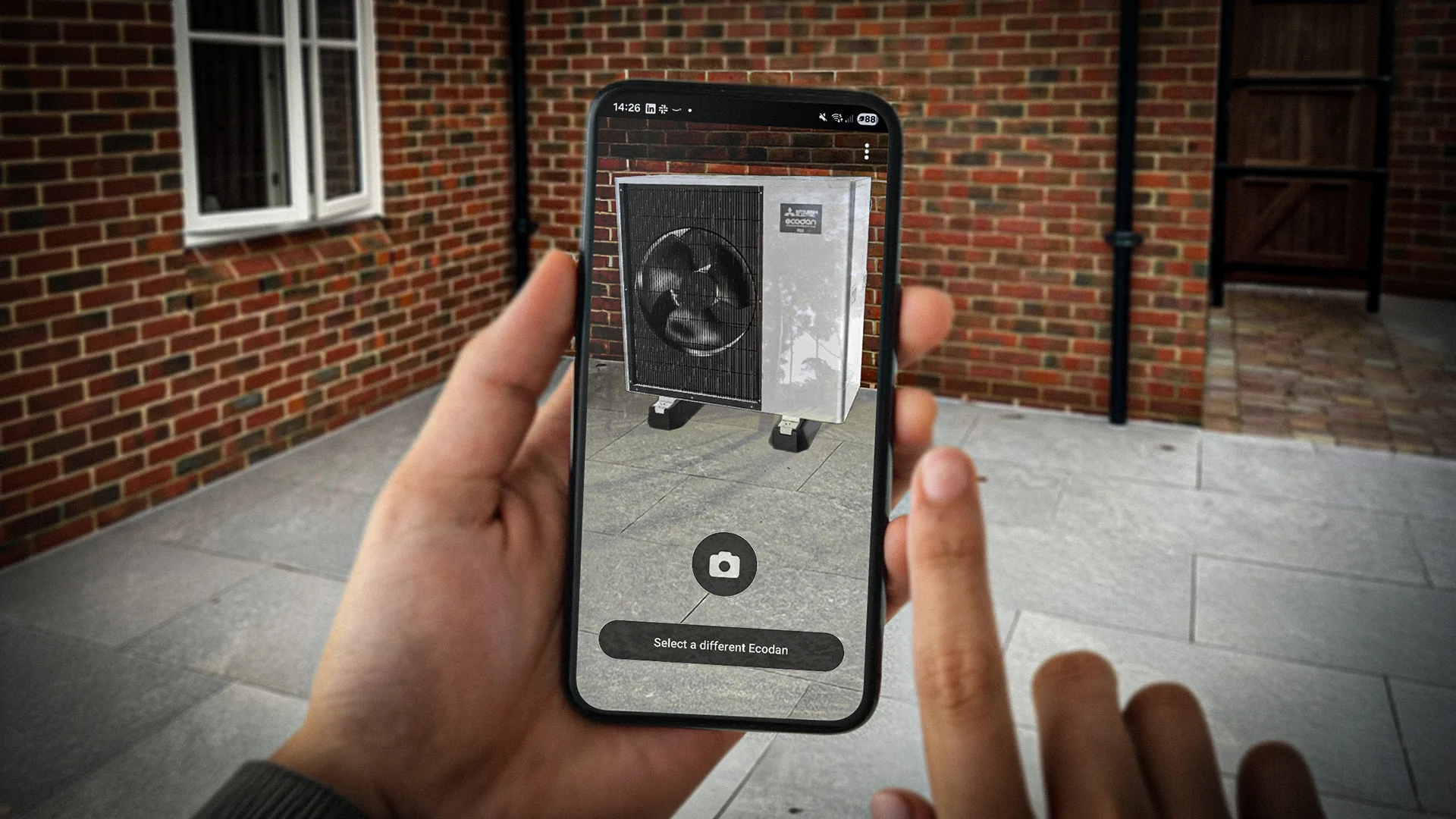 The See My Ecodan augmented reality app showing a Mitsubishi Electric heat pump placed in a garden